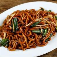 Wok Stir Garlic Noodle · Fresh egg noodle with bean sprouts and green onion.