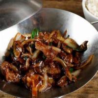Mongolian Beef · Onion, green onion, mushroom with a bowl of jasmine rice