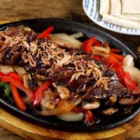 Hanger Steak BBQ Mushu Wraps · Marinated with Korean spices, sautéed vegetable.