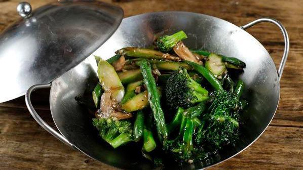 Wok Stir Seasonal Vegatbles · Assorted vegetables with garlic ginger sauce.