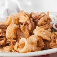 Calamari Fritti · Semolina herb crusted squid lightly fried and served with horseradish cocktail and tartar sa...
