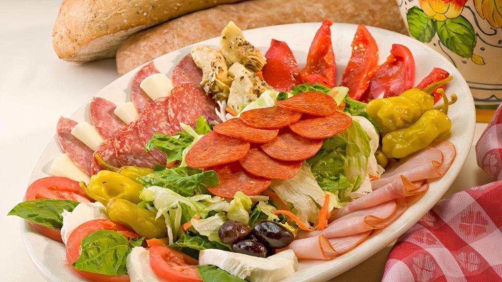 Antipasti Salad (serves 4+) · Large salad of fresh mixed greens with Italian dressing, Capicola & dry salami, Genoa Salami, pepperoni, provolone, fresh mozzarella & more.