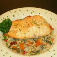 Baked Salmon Risotto · Oven baked salmon served over risotto with onion, artichoke heart, red bell pepper, mushroom...