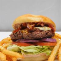 D's Big Bacon Cheeseburger · Prime beef, cooked to order, topped with bacon, provolone, cheddar, lettuce, tomato, pickles...