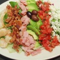 Chef Cobb Salad · An assortment of fresh greens tossed with shrimp, bacon, ham, avocado, tomatoes, and fresh c...