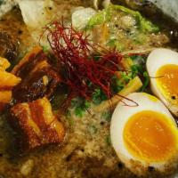 Kakuni Tonkotsu Ramen · Pork & chicken bones based soup with Kakuni Pork, Egg, Cabbage, Kikurage, Green Onion, Menma