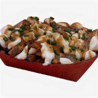 Poutine · French fries topped with gravy and cheese curds.