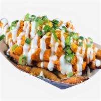 Buffalo Fries · French fries topped with fried chicken pieces, buffalo sauce, shredded cheese, blue cheese d...