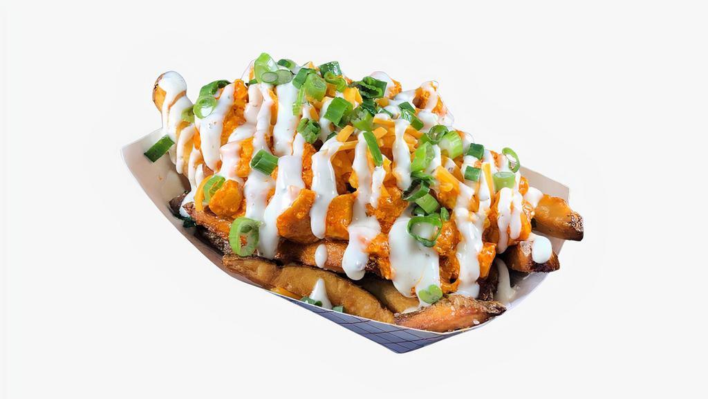 Buffalo Fries · French fries topped with fried chicken pieces, buffalo sauce, shredded cheese, blue cheese dressing and scallions.