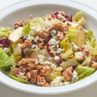 Chopped Salad · With candied walnuts, apples, avocado, blue cheese and mustard-dill vinaigrette. (contains n...