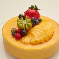 Mango Mousse · White sponge cake filled with mango mousse and fresh mango