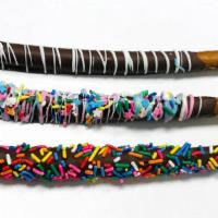 3 Pretzel Rods - Chocolate · Three pieces of Pretzel Rods dipped in Chocolate, with sprinkles.