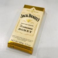 Jack Daniel's -Tennessee Honey  · Swiss Milk chocolate with Jack Daniels Tennessee Honey syrup center.