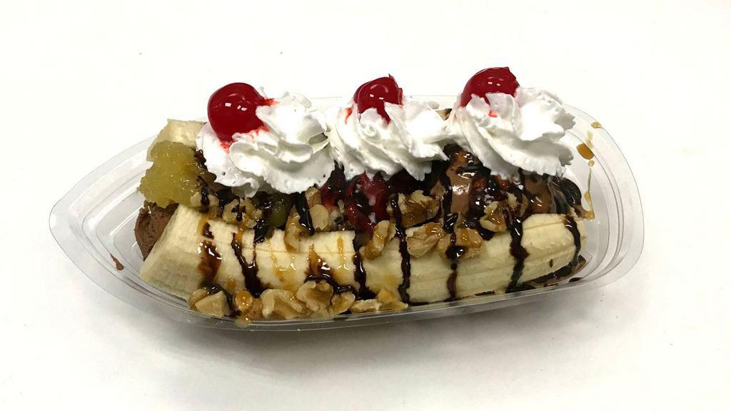Banana Split · Choice of three ice cream and banana with strawberry, pineapple, caramel, chocolate topping, whip and nuts and cherry. Delivered in a Nice  Clamshell container.