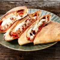 Big Wednesday Calzone (Small) · Mozzarella, ricotta, garlic, caramelized onions, Italian sausage, roasted red peppers, peppe...