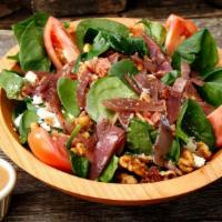 Back Country Betty · Spinach, smoked bacon, feta, candied walnuts, caramelized onions, and vine ripe tomatoes. 36...