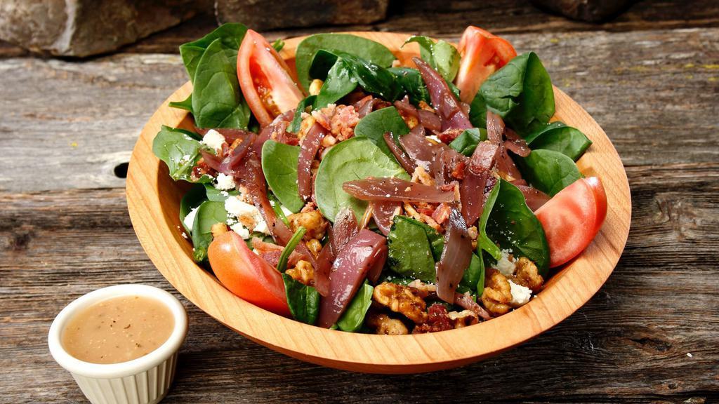 Back Country Betty · Spinach, smoked bacon, feta, candied walnuts, caramelized onions, and vine ripe tomatoes. 368 cal.