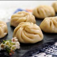 Handmade Steam Chicken MOMO · Handmade tasty dumplings with your choice of veg or chicken served with tomato sauce and spe...