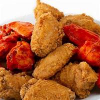 Traditional Wings · Traditional or tossed in our buffalo or sweet & sour sauces, these wings are fried and seaso...