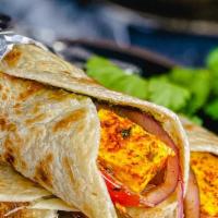 PANEER TIKKA FRANKIE* · Popular Indian street-food, Paneer Kathi rolls are warm, flatbread filled with spicy paneer,...