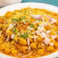 SAMOSA CHAAT* · Tangy and spicy Samosa Chaat is popular north Indian street food. Crunchy samosa is served w...