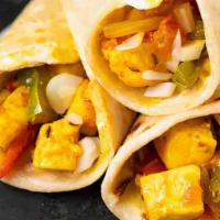 PANEER KATHI ROLL* · Paneer Kathi Roll is made with flatbread, stuffed with paneer (Indian Cottage Cheese) that h...