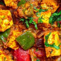 KADAI PANEER (12oz)* · Vibrant, tangy, spiced indian cottage cheese (paneer) cooked in onion tomato gravy made with...