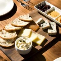 Artisan Cheese Plate · Valdeón, manchego, urgelia, & marinated, queso fresco, served with membrillo el quijote,