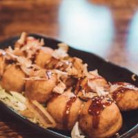 Takoyaki (8pc) · Little leg of octopus, battered and fried into a ball, sauced, and topped with bonito flakes...