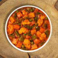 Mixed Veggies · Potatoes, cauliflower, carrots, peas and bell peppers cooked in creamy curry. Vegan.