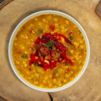 Dal Tadka Tapes · Yellow lentils seasoned with garlic, cumin and cilantro. Vegan.