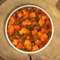 Sir Mixed A Lot Vegetable Dinner · Potatoes, cauliflower, carrots, peas and bell peppers cooked in creamy curry. Vegan. Comes w...