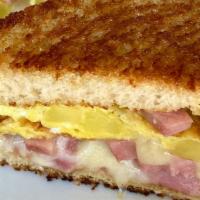 The Pony Express · Potato, ham, egg, cheddar cheese on country loaf with the black horse's own getty up sauce. ...