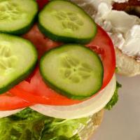 Cancelled Meating · Bagel, cream cheese, tomato, cucumber and onion. tell the boss to beat it.