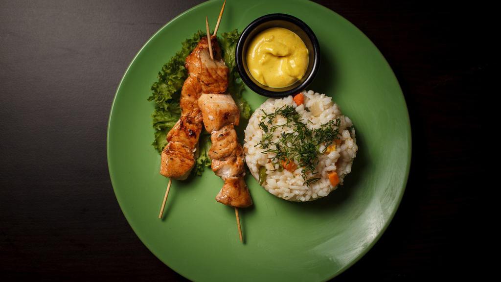 Chicken Kebab Plate · Fresh cut chicken, skewered and seasoned with Greek spices, cooked over open flame served with jasmine rice and hummus.