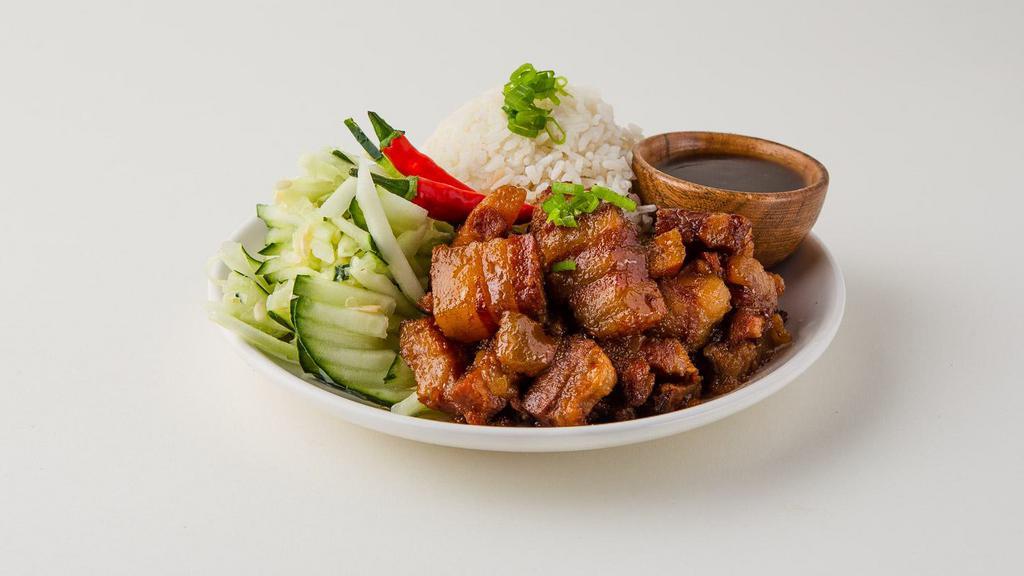 Caramelized Pork Belly Bowl · Steamed white rice with a serving of braised vietnamese porkbelly and a side of veggies.