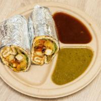Paneer Wrap · Paneer paratha wrapped with thin slices of seasoned paneer, potato patty, lettuce, cucumber,...
