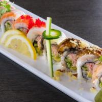Rainbow · Real crab, avocado, and cucumbers topped with an assortment of fish and unagi.