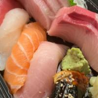 Tum-Tum Combo · Five pieces of nigiri (chef's choice) and your choice of sashimi (maguro, sake, or hamachi).