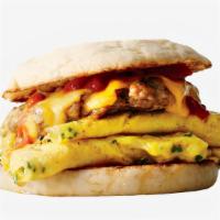 Egg, Sausage & Cheese B*tches Breakfast Sandwich · An egg sandwich with two eggs scrambled, chicken sausage, and melted cheddar cheese with a s...