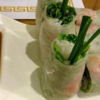 A1. Goi Cuon · Shrimp spring rolls served, with peanut sauce (3 pcs).