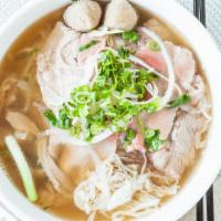 4. Pho Dac Biet · Combination rice noodle soup, thin sliced beef, flank, tendon, and beef balls.