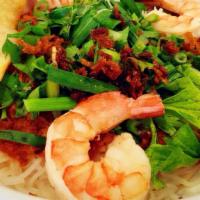 12. Hu Tieu/ Mi Ba Nam Sa Doc · Rice/egg noodle (dry) with jumbo prawn and lean pork loin. Soup on the side.