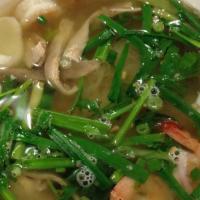 13. Hu Tieu / Mi Nam Vang · Rice/egg noodle soup, shrimp, ground pork, pork stomach, fish ball, and squid.