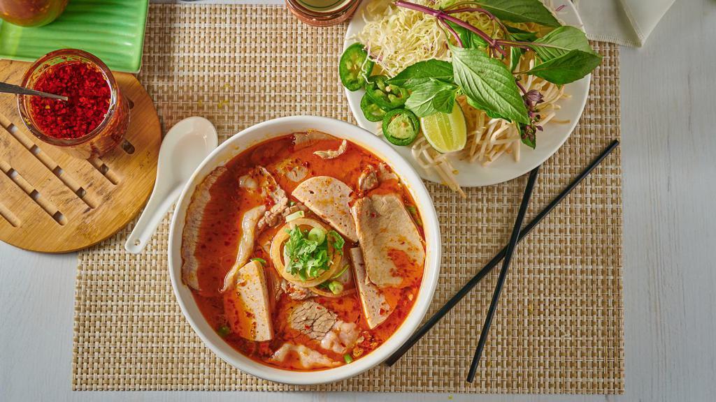 20. Bun Bo Hue · Spicy beef noodle soup, beef brisket, sliced pork, pork blood, Vietnamese ham, and lemongrass.
