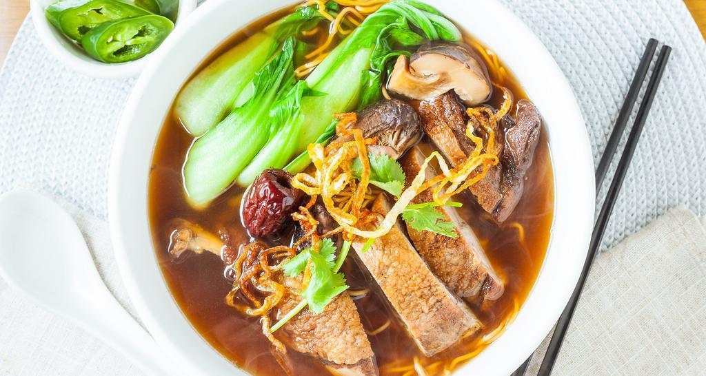 19. Mi Vit Tiem · Egg noodle soup with duck leg, shiitake mushrooms, and baby choy vegetables.