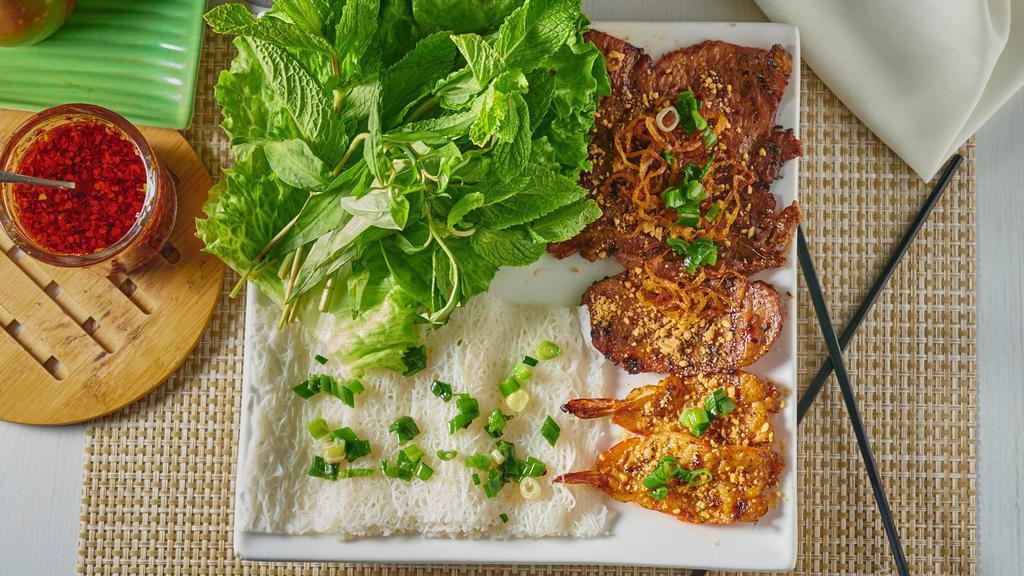 28. Bun/Banh Hoi Thit Nuong · Grilled pork over vermicelli noodle, crushed peanuts, mix greens, fish sauce