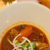 39. Com/Banh Mi Bo Kho · Beef stew with your choice of steamed rice or French bread.
