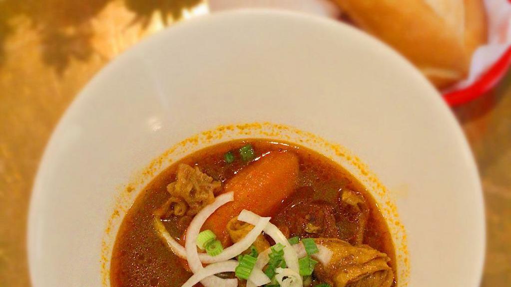 39. Com/Banh Mi Bo Kho · Beef stew with your choice of steamed rice or French bread.