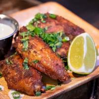 Hot and Smoky Chicken Wings · adobo roasted wings, scallions, cilantro, lime, savory Point Reyes blue cheese dipping sauce